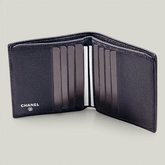 EDIT8 COLLECTIVE black caviar leather Chanel bifold wallet with multiple card slots and bill compartments.