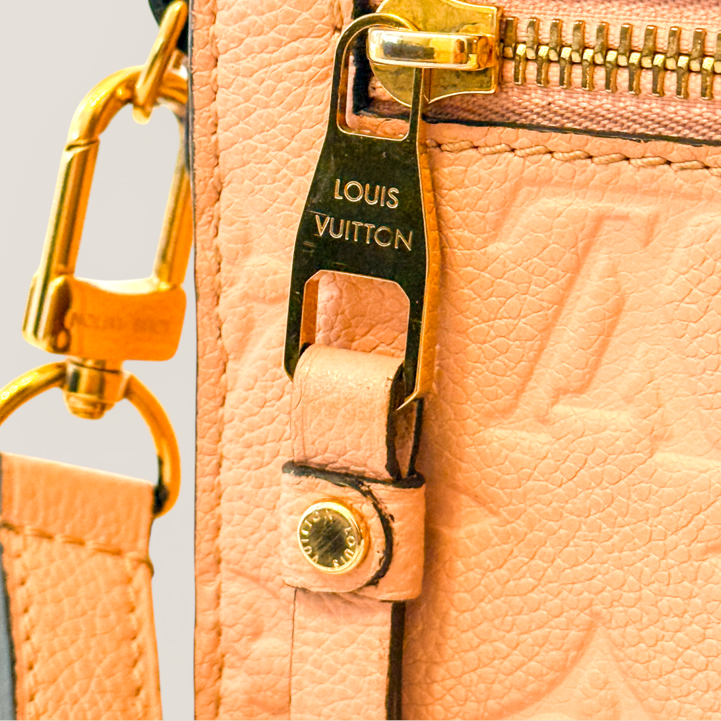 Louis Vuitton Pochette Métis | Monogram Empreinte Rose Poudre | Entrupy Authenticated