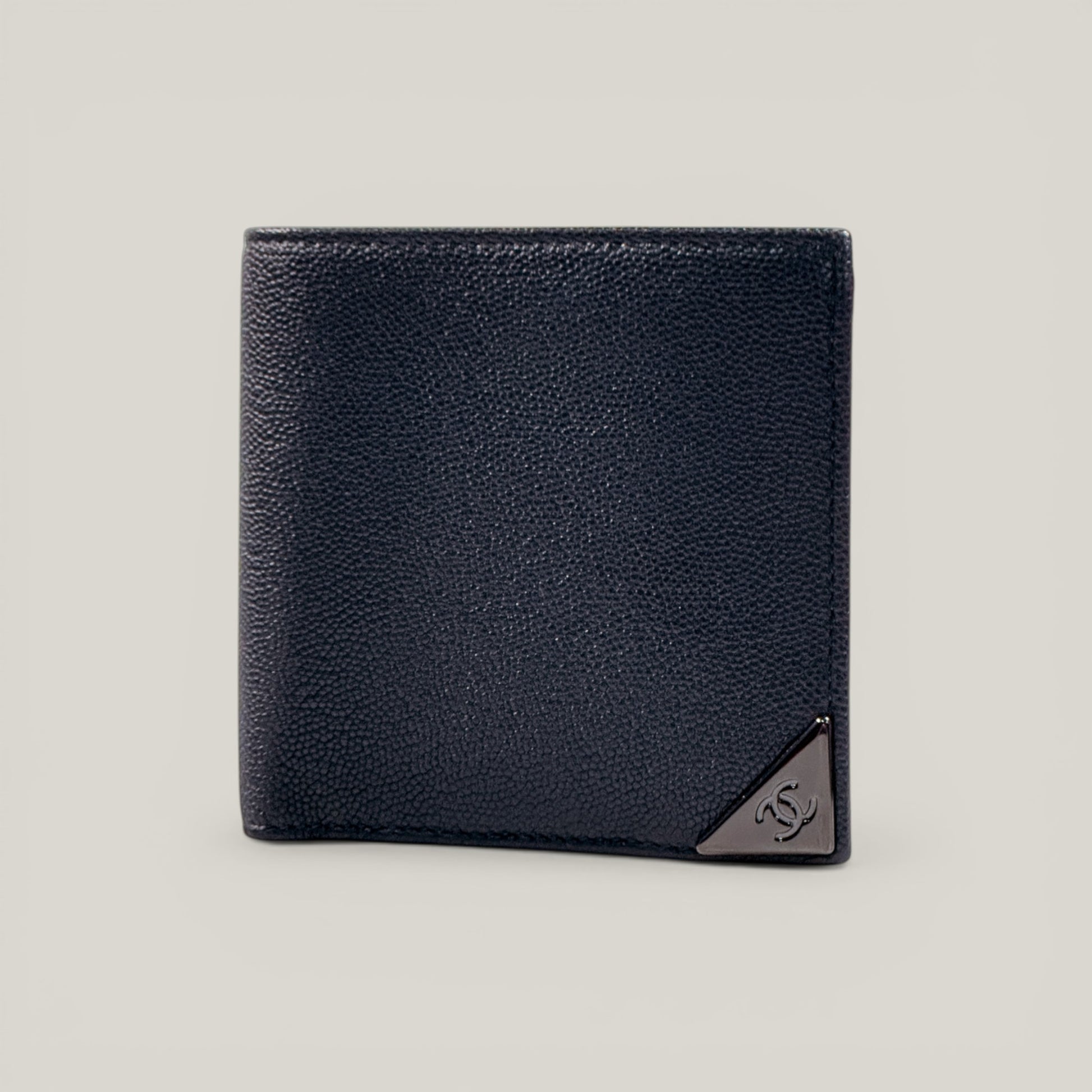 EDIT8 COLLECTIVE black caviar leather bifold wallet with gold-tone hardware and multiple card slots.