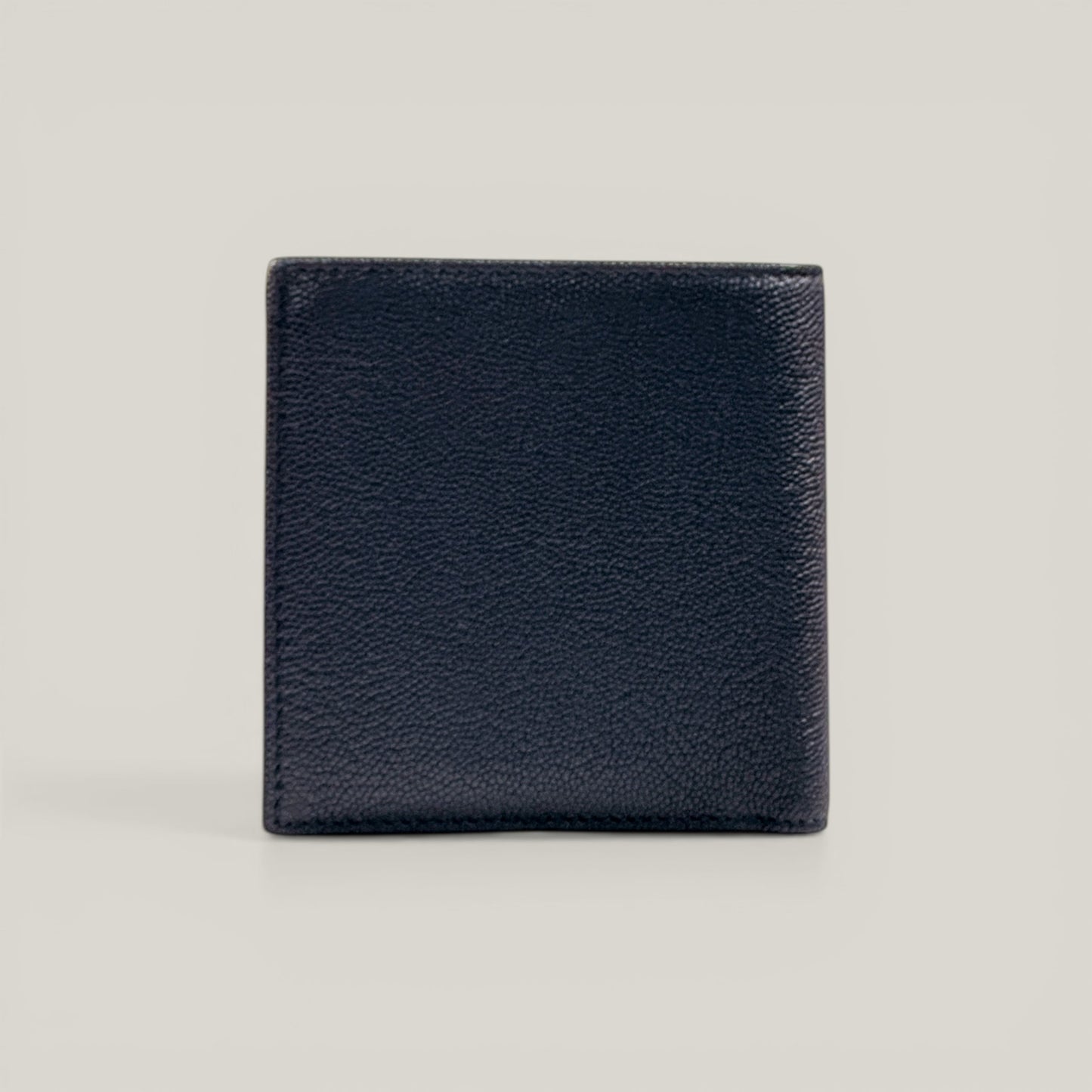 EDIT8 COLLECTIVE black caviar leather bifold wallet with multiple card slots and bill compartments.