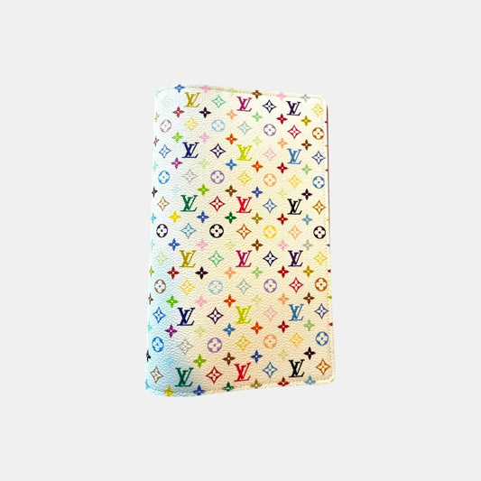 EDIT8 COLLECTIVE Louis Vuitton x Murakami Emily notebook cover in white with multicolor monogram pattern. Coated canvas.